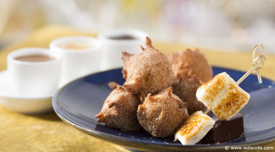 Warm homemade banana fritters dusted with sugar and cinnamon