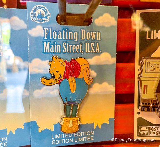 2022-wdw-magic-kingdom-frontierland-frontier-trading-post-store-floating-down-main-street-usa-winnie-the-pooh-pin-653x600.jpg
