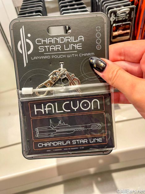 lanyard-pouch-with-charm-chandrila-collection-merchandise-store-2022-wdw-galactic-starcruiser-star-wars-hotel-media-preview-469x625.jpg