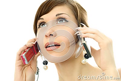 young-woman-talking-two-cell-phones-7969537.jpg